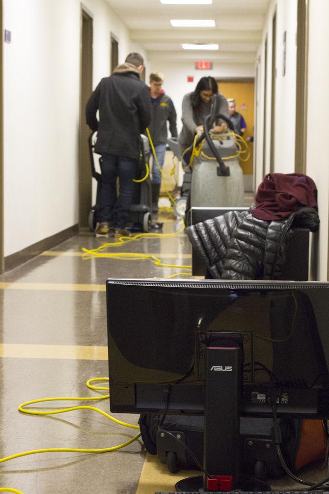 Electronics and valuables are placed in the hallways to keep dry from the leaking water in West Hall on LSU's campus on Wednesday, Jan. 17, 2018.