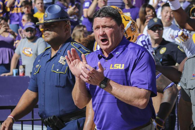 LSU Head Coach Ed Orgeron leads the Tigers before the Tigers&#8217; 33-10 victory against Arkansas on Saturday, Nov. 11, 2017, in Tiger Stadium.