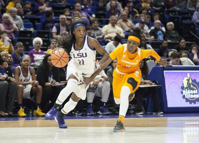 LSU senior guard Raigyne Louis (11) dribbles the ball during the Tigers' 70-59 victory over Tennessee on Sunday, Jan. 28, 2018 in the PMAC.