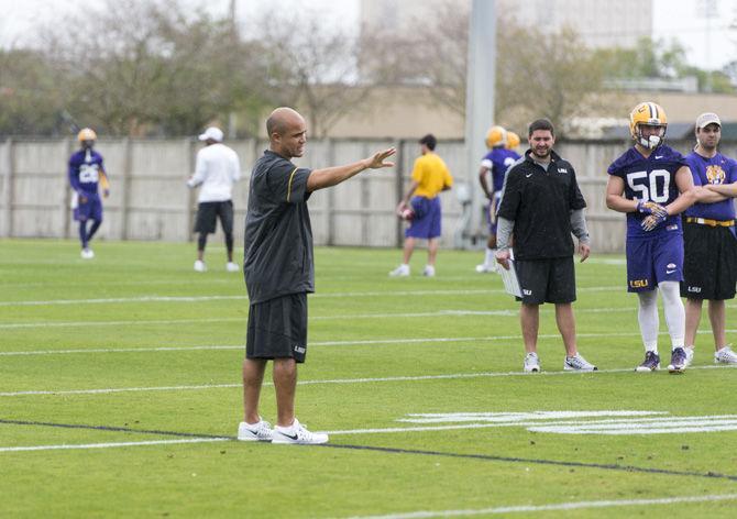 LSU defensive coordinator Dave Aranda directs defensive players during the first spring football practice on Saturday, March 11, 2017 at the Charles McClendon LSU football practice facility.