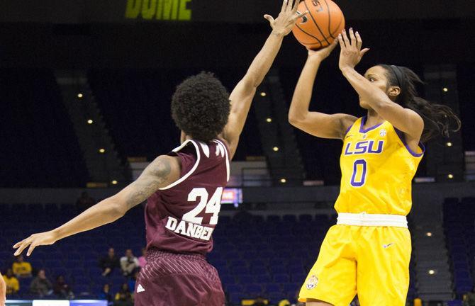 LSU junior guard Chloe Jackson (0) shoots the ball on Sunday, Jan. 7, 2018, during the Tigers&#8217; 83-70 loss against Mississippi State in Pete Maravich Assembly Center.