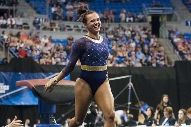 LSU senior all-arounder Ashleigh Gnat vaults during the Tigers' first place win in the NCAA Semifinals Session II with a 198.275 team score to advance to the Super Six Championship on Friday, April 14, 2016 in the Chaifetz Arena, in St. Louis, Missouri.