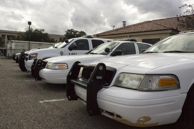 Squad cars rest in the LSUPD station parking lot on Wednesday, January 11, 2016.