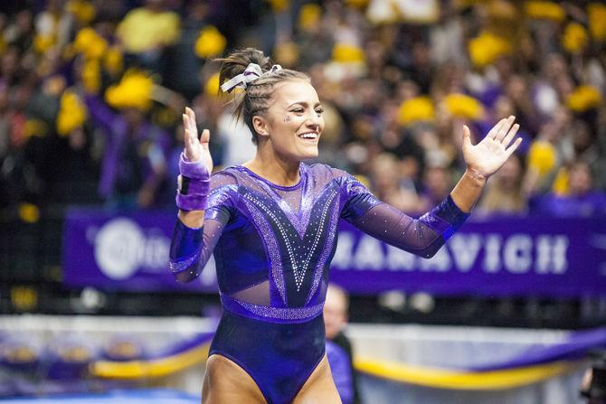 LSU junior Lexie Priessman celebrates after landing her vault during the Tigers' 197.15-195.350 victory against Arkansas on Friday, Jan. 5, 2018, in the PMAC.