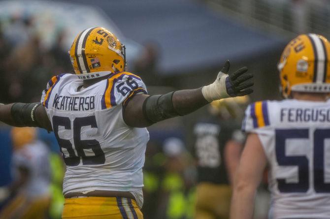 LSU junior offensive tackle Toby Weathersby (66) celebrates during the Tigers' 17-21 loss to Notre Dame in the Citrus Bowl on Monday, Jan. 1, 2018 in Camping World Stadium in Orlando, Florida.