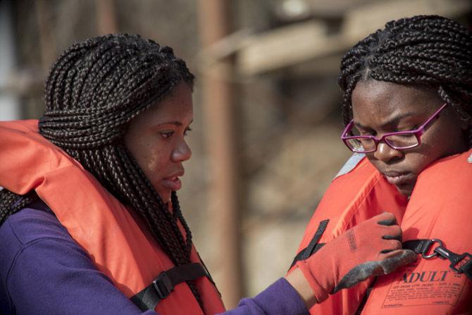 Volunteer LSU canoes Bayou Manchac in cleanup effort