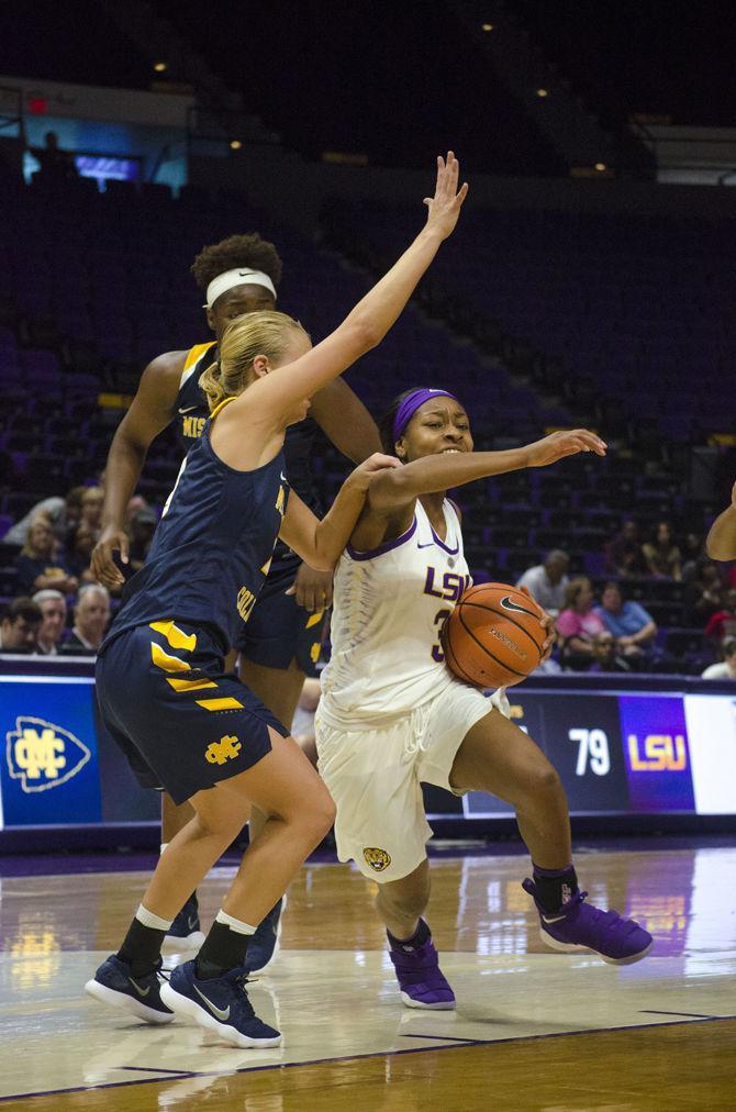 LSU freshman guard Khayla Pointer (3) moves through opposing players during the Tigers' 96-34 victory against Mississippi College on Sunday, Nov. 5, 2017, in the Pete Maravich Assembly Center.