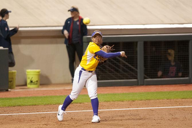 LSU junior third baseman Shemiah Sanchez (23) throws the ball to first base during the Tigers' 3-0 victory over Illinois-Chicago on Thursday, Feb. 8, 2018 in Tiger Park.