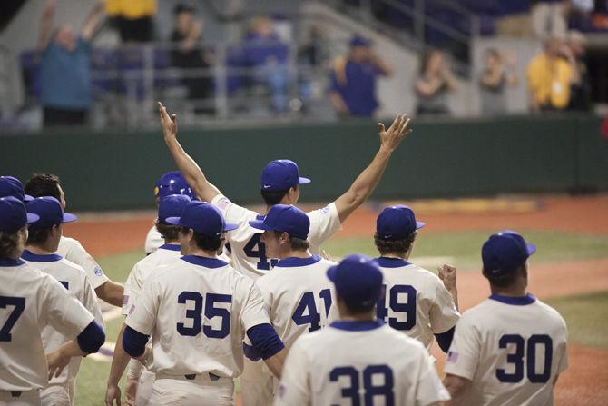 The LSU baseball team celebrates during the Tigers&#8217; 10-3 victory over Grambling State University on Tuesday, Feb. 27, 2018, at Alex Box Stadium.