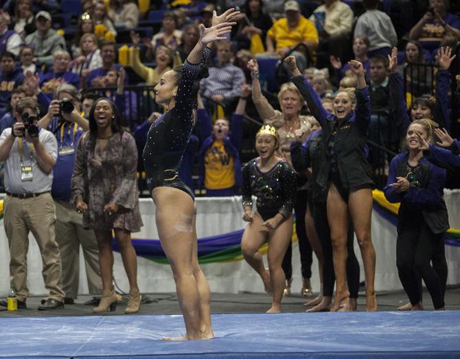 LSU all-around senior Myia Hambrick sticks her landing during the Tigers&#8217; 197.225-196.700 victory over Kentucky on Friday, Feb. 2, 2018, in the PMAC.