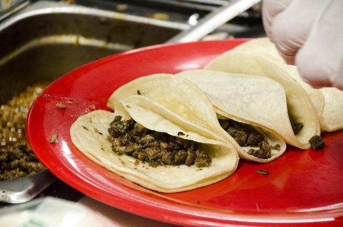 Manager Derrick Sanchez prepares food on Thursday, Feb. 15, 2018, at Mr. Taco Cantina on 14111 Airline Highway in Baton Rouge.