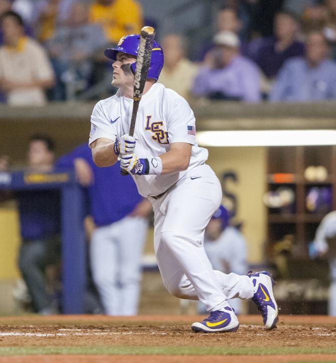 LSU senior outfielder Beau Jordan (24) hits the ball during the Tigers' 7-6 victory against Notre Dame on Friday, Feb. 16, 2018, in Alex Box Stadium.