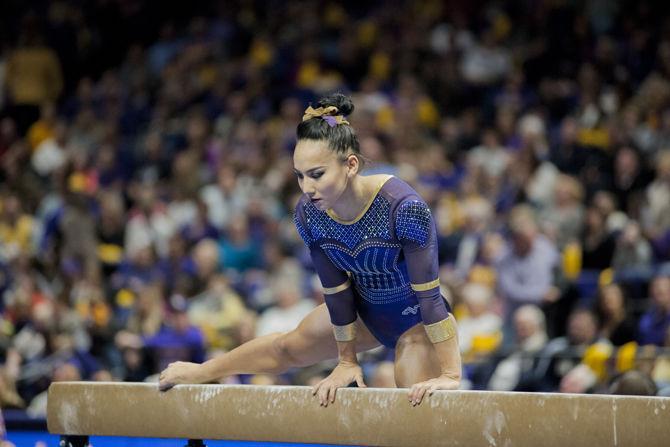 LSU all-around senior Myia Hambrick competes on the balance beam during the Tigers' 197.450-196.725 victory against Alabama on Friday, Jan. 19, 2018, in the PMAC.