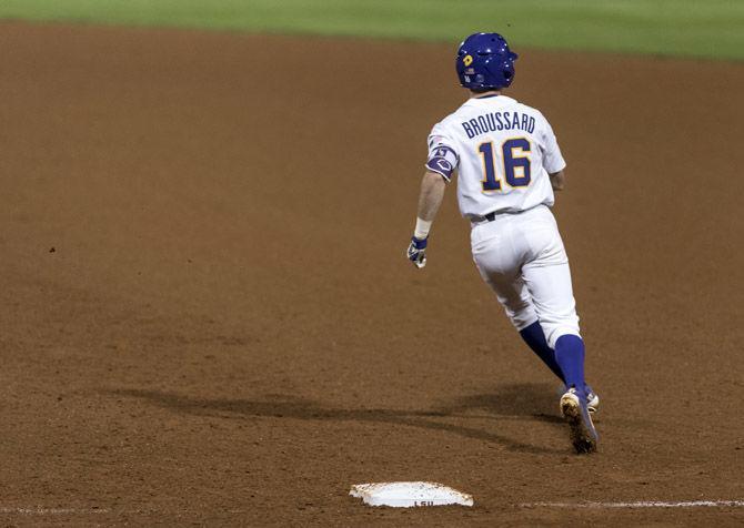 LSU junior infielder Brandt Broussard (16) runs past first base during the Tigers&#8217; 13-4 victory over the University of Texas Longhorns in Alex Box Stadium on Friday, Feb. 23, 2018.