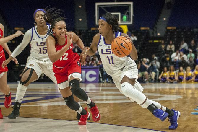 LSU senior guard Raigyne Louis (11) runs down the court with the ball during the Tigers' 71-60 win against Georgia on Thursday, Feb. 1, 2018, in the PMAC.