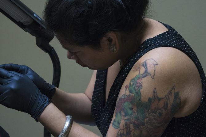 Tattoo shop owner uses space for personal art, creativity