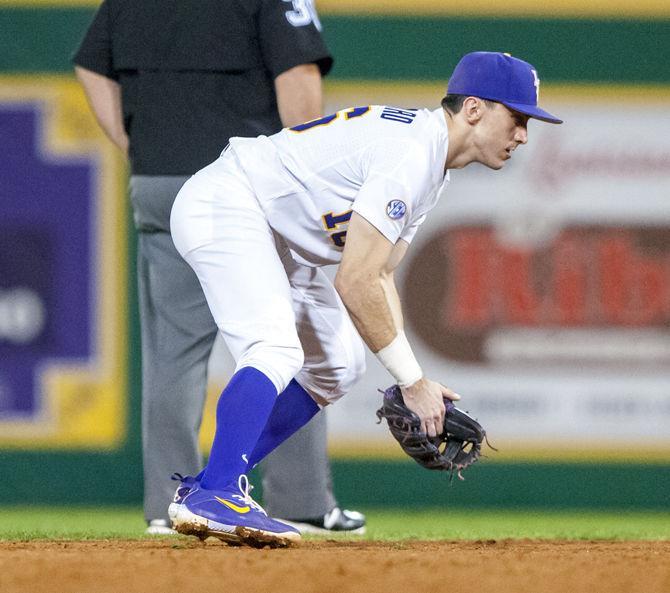 LSU junior infoelder Brandt Broussard (16) catches the ball during the Tigers' 7-6 victory against Notre Dame on Friday, Feb. 16, 2018, in Alex Box Stadium.