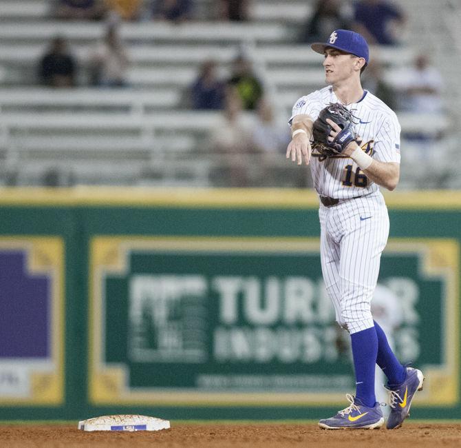 LSU junior infielder Brandt Broussard (16) throws the ball during the Tigers' 14-6 victory over UNO on Wednesday, Feb. 21, 2018, in Alex Box Stadium.