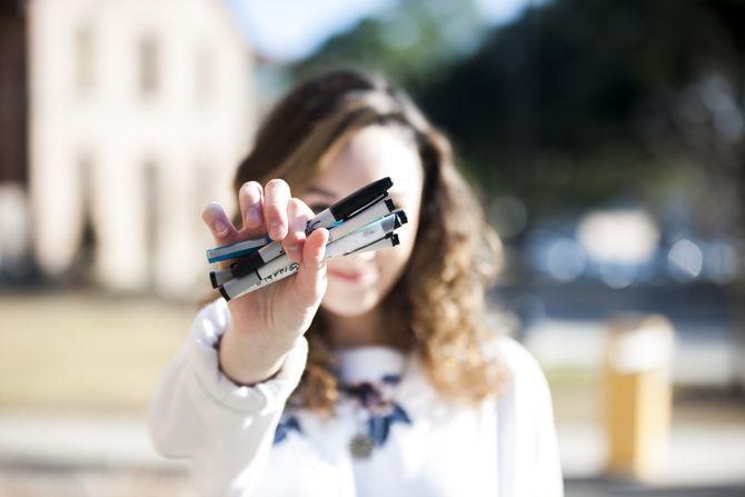 LSU graphic design junior Stephanie Clavin holds her tools in front of the Art and Design building on Wednesday, Jan. 31, 2018.