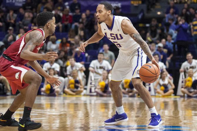 LSU junior guard Daryl Edwards (5) dribbles the ball during the Tigers' 94-86 win against Arkansas on Saturday, Feb. 3, 2018, in the PMAC.