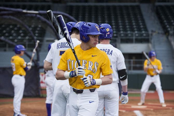 LSU freshman infield Hal Hughes (3) practice at Alex Box Stadium on Friday, Jan. 26, 2018.