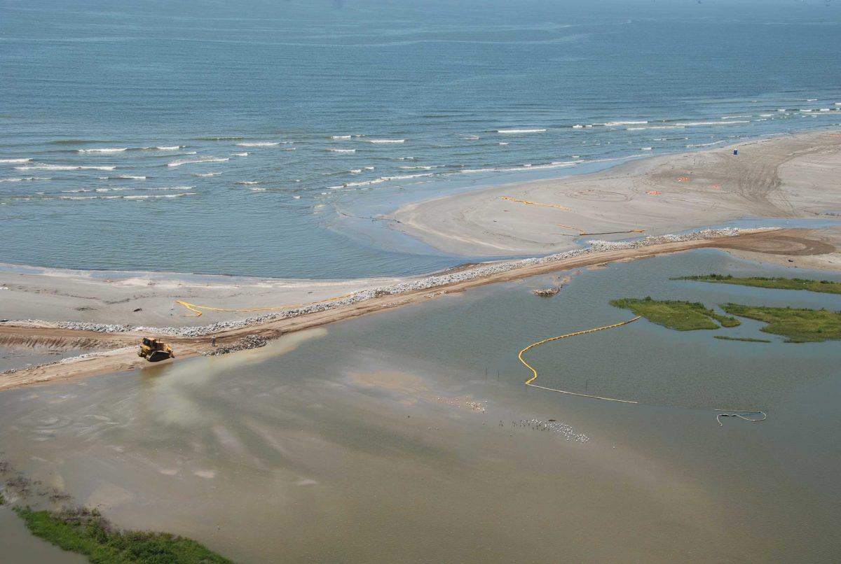 Soldiers of the Louisiana National Guard&#8217;s 527th Engineer Battalion, 225th Engineer Brigade, work to reinforce oil protection barriers and land bridges along Elmer&#8217;s Island, La., near Grand Isle and Port Fourchon, La., July 9, 2010.