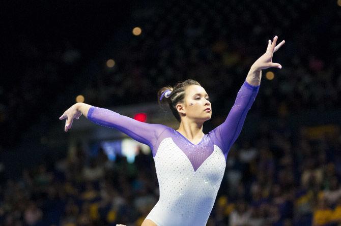 LSU all-around junior Sarah Finnegan competes in the beam competition during the Tigers&#8217; 198.125-195.525 victory over Arizona on Saturday, March 17, 2018, in the PMAC.