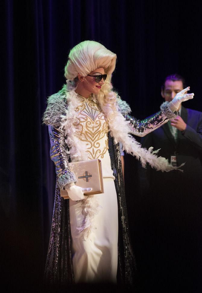 Milo Yiannopoulos greets the crowd as he walks on stage on Wednesday Sept. 21, 2016, in the LSU Union Theatre.