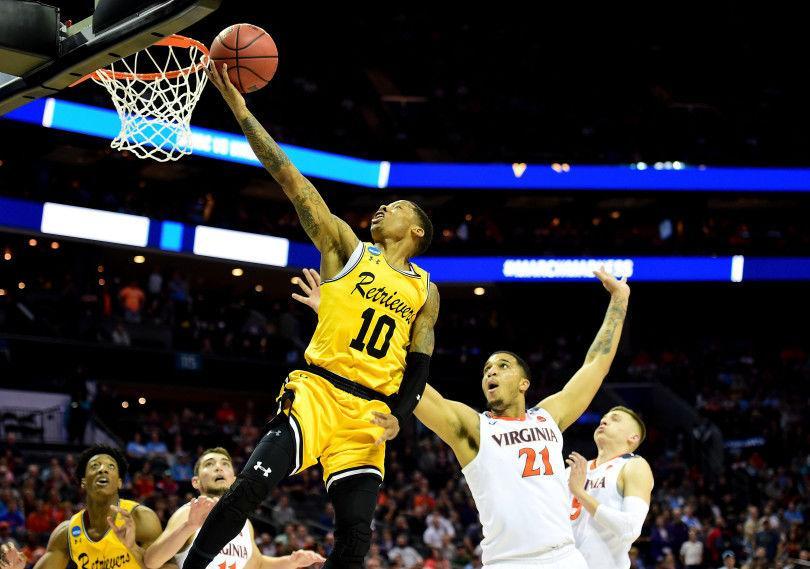 UMBC senior guard Jairus Lyles drives to the basket during Retrievers' historic upset of Virginia.