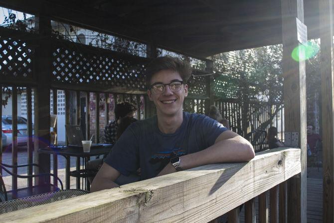 LSU mass communication major and theater actor Jacob McManus enjoys Garden District Coffee on Thursday, Feb. 22, 2018.