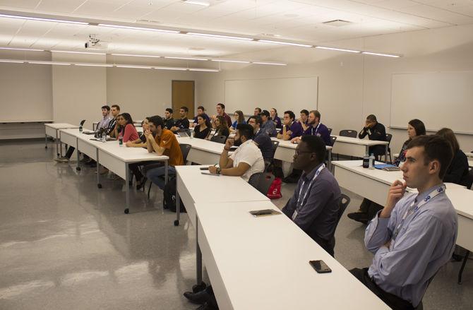 Members of the North American Society of Petroleum Engineers listen to Koray Kinik during the society's symposium in Patrick F. Taylor Hall on Saturday, Feb. 24, 2018.