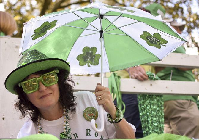 A young lady sports her green accessories at the St. Patrick's Day Parade on Saturday, March 18, 2017 in Baton Rouge.