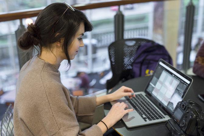 Photography senior Charlene Guilliams edits photographs on her laptop in the LSU Student Union on Monday, March 12, 2018.