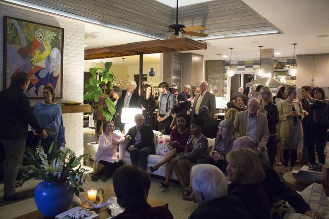 Guests at the trailer viewing party for the Louisiana International Film Festival gather around to begin watching trailers on Thursday, March 8, 2018 in Baton Rouge.