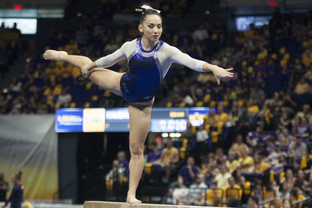 LSU all-around senior Myia Hambrick competes in the beam competition during the Tigers' 198.100-195.625 victory over Auburn on Sunday, March 4, 2018, in the PMAC.