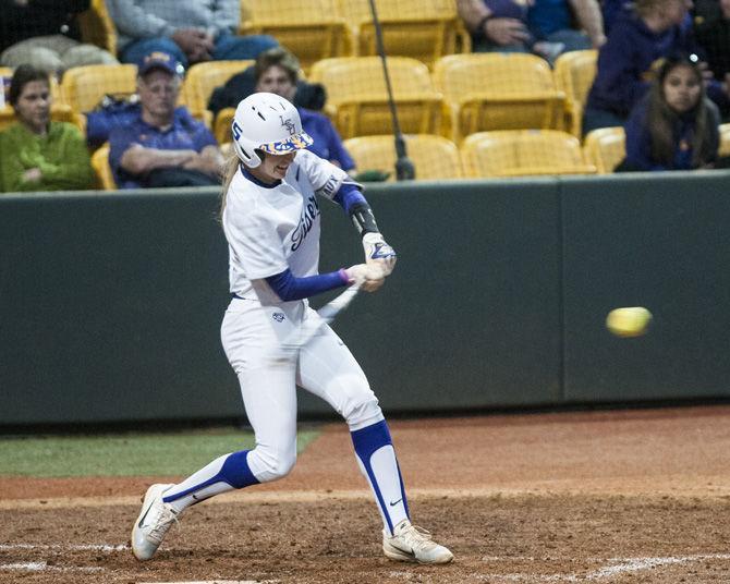 LSU junior infielder Becca Schulte (7) hits the ball during the Tigers&#8217; 1-0 win over Illinois State University on Friday, March 2, 2018, in Tiger Park.