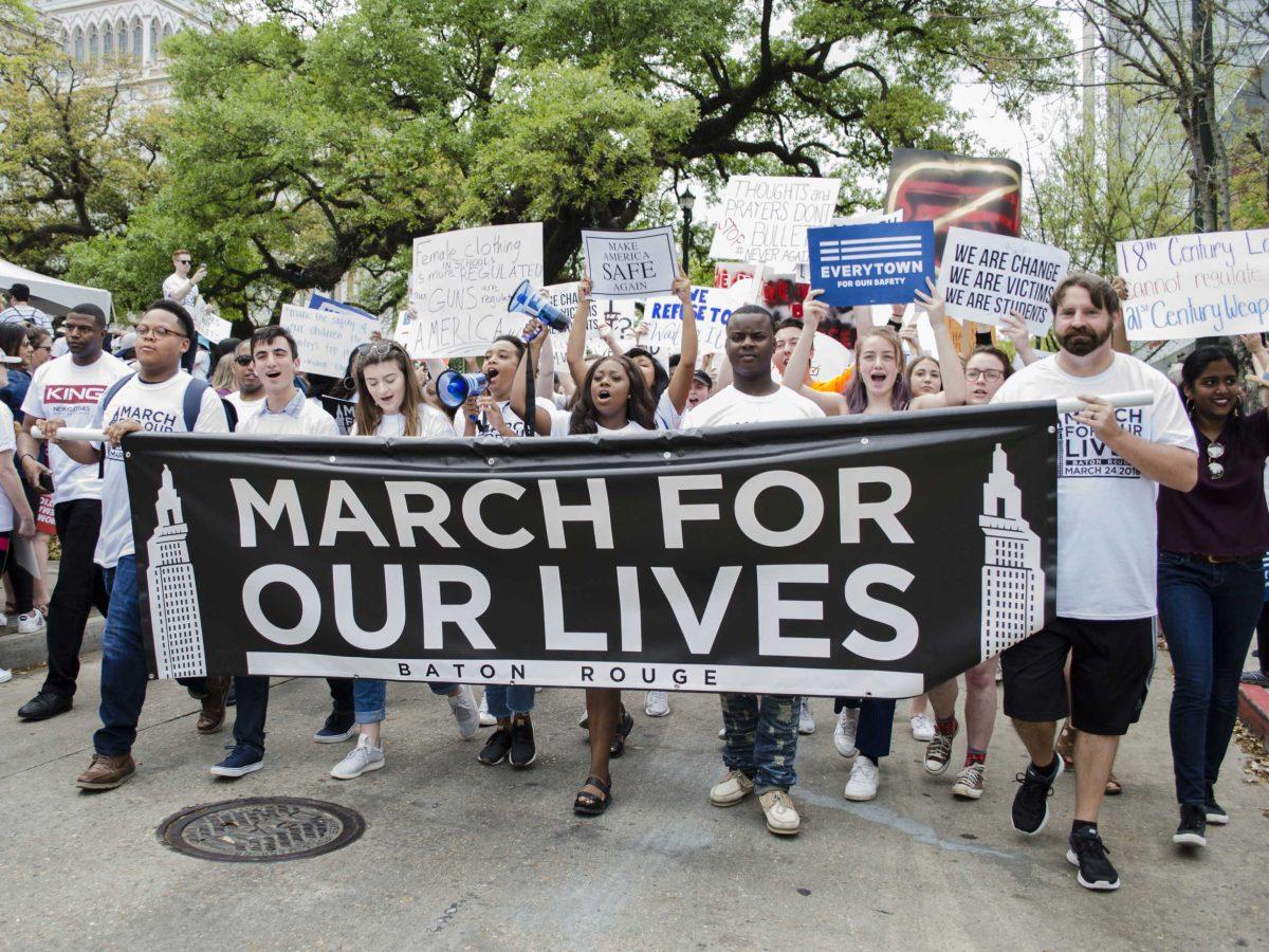 Protesters show their support during the March For Our Lives on Saturday, March 24, 2018 in Baton Rouge.