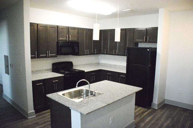 A kitchen in Nicholson Gateway Apartments is finished on Thursday, March 8, 2018.