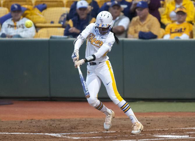 LSU sophomore outfielder Aliyah Andrews (4) hits the ball during the Tigers&#8217; 3-2 win against Auburn on Friday, March 9, 2018, at Tiger Park.