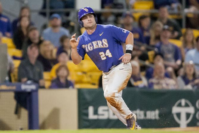 LSU senior outfielder Beau Jordan (24) runs to home plate during the Tigers&#8217; 5-1 win against Hawaii on Saturday, March 10, 2018, at Alex Box Stadium.