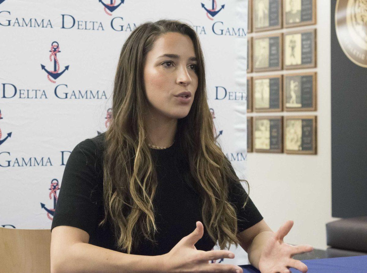 Olympic gymnast and activist Aly Raisman answers questions before speaking at Delta Gamma's Lectureship in Values and Ethics event on Wednesday, April 11, 2018, in the PMAC on LSU campus.