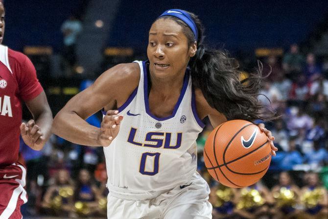 LSU junior guard Chloe Jackson (0) runs down the court with the ball during the Tigers' 79-78 win against Alabama on Sunday,&#160;Feb. 25, 2018, in the PMAC.