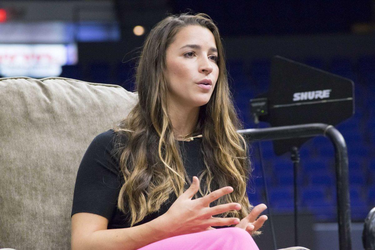 Olympic gymnast and activist Aly Raisman speaks at Delta Gamma's Lectureship in Values and Ethics event on Wednesday, April 11, 2018, in the PMAC on LSU campus.