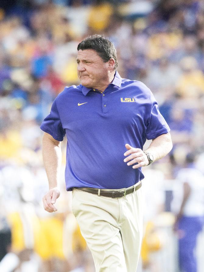 LSU coach Ed Orgeron watches the team play during the LSU spring football game at Tiger Stadium.