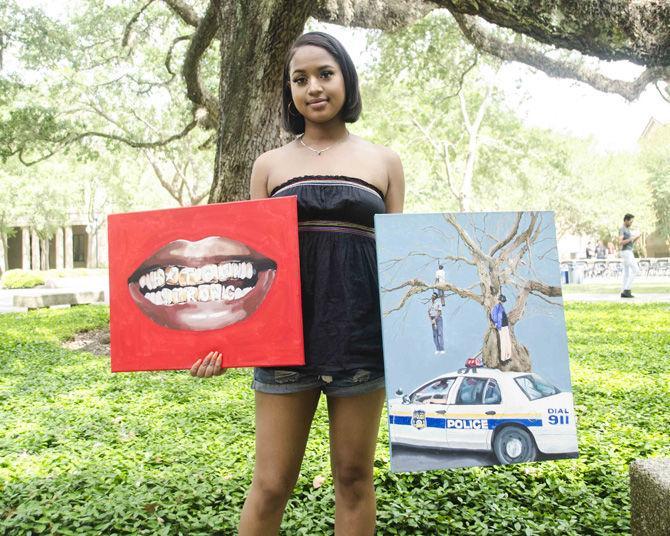 LSU studio art sophomore Chayse Sampy showcases her artwork in the LSU Quad on Friday, April 13, 2018.