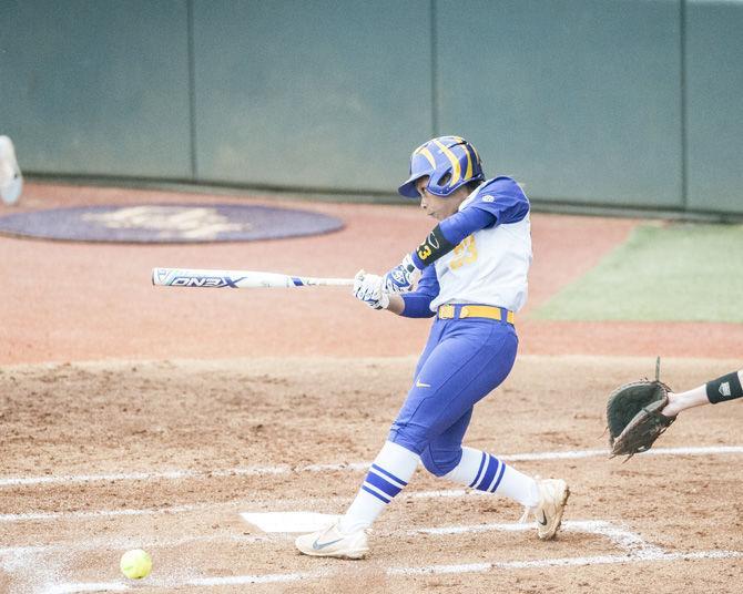 LSU junior infielder Shemiah Sanchez (23) hits the ball during LSU&#8217;s 2-0 victory over Texas A&amp;M on Friday, April 20, 2018, at Tiger Park.