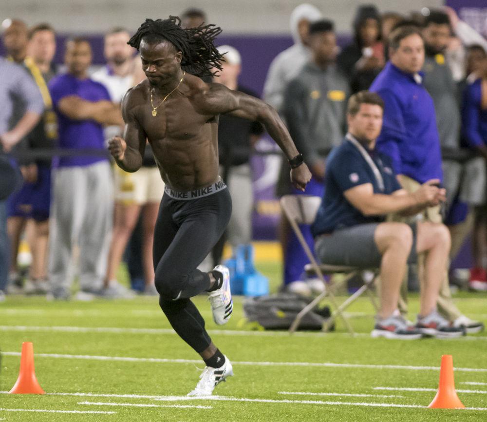 LSU defensive back Donte Jackson runs the 40-yard dash at LSU's NFL Pro Day on Wednesday, April 4, 2018 in the Indoor Practice Facility.