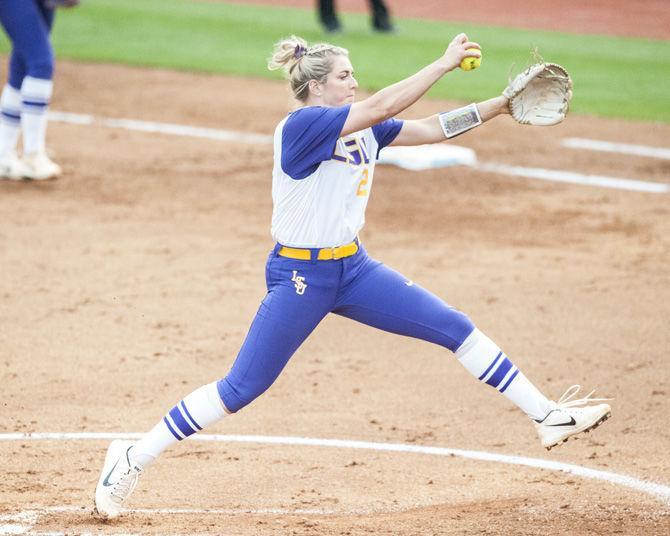 LSU senior pitcher Carley Hoover (21) pitches the ball during LSU&#8217;s 2-0 victory over Texas A&amp;M on Friday, April 20, 2018, at Tiger Park.