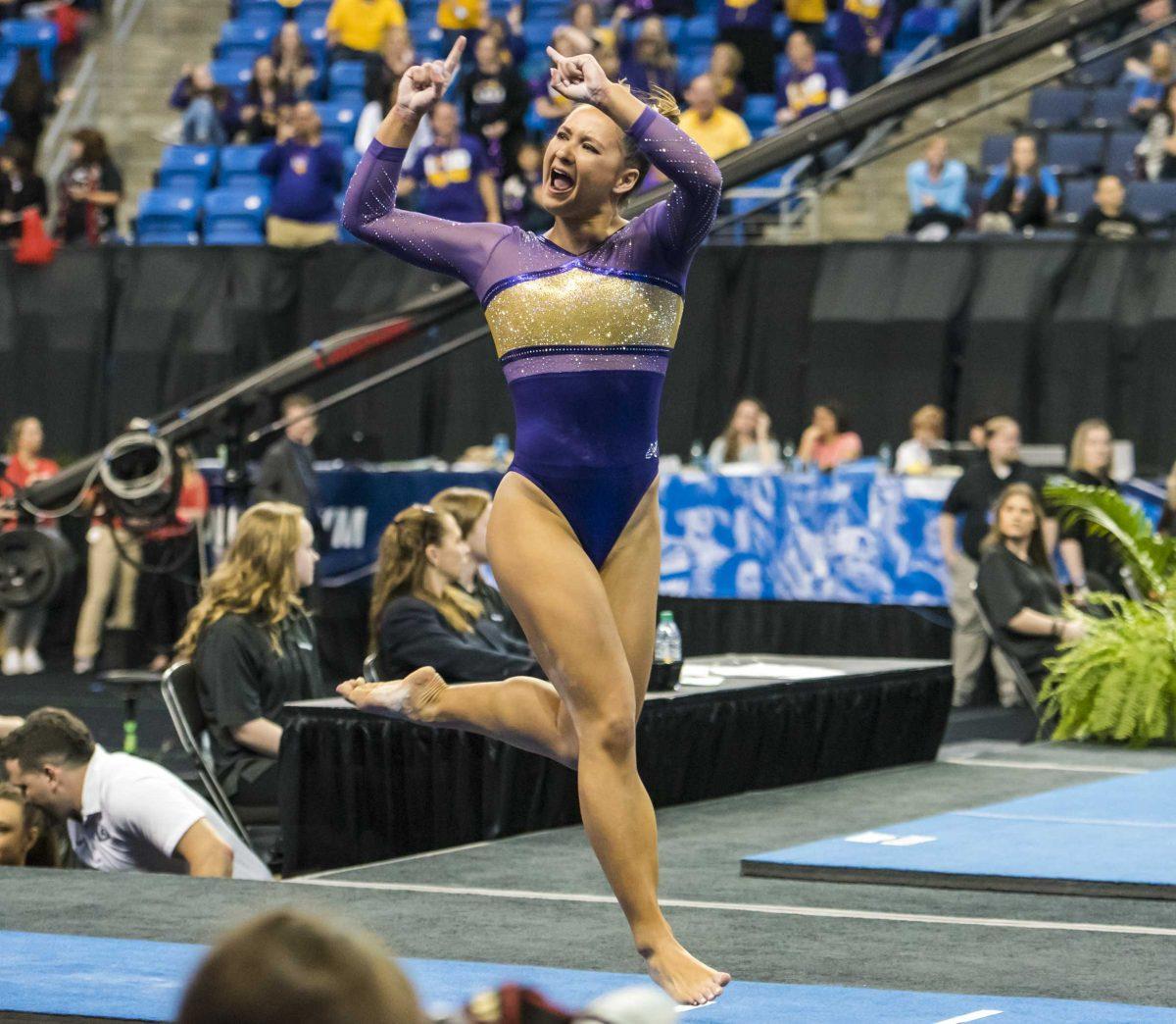 LSU junior Sarah Finnegan cheers after her vault during the Semifinals of the NCAA Gymnastics Super Six on Friday, April 20, 2018, in Saint Louis, Missouri at the Chaifetz Arena.