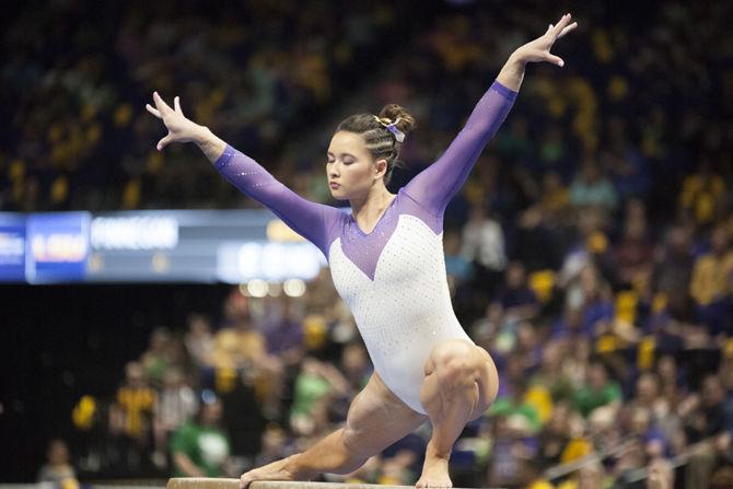 LSU all-around junior Sarah Finnegan competes on the balance beam during the Tigers&#8217; 198.125-195.525 win over Arizona on Saturday, March 17, 2018, in the PMAC.